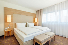 Отель H+ Hotel Salzburg, Зальцбург